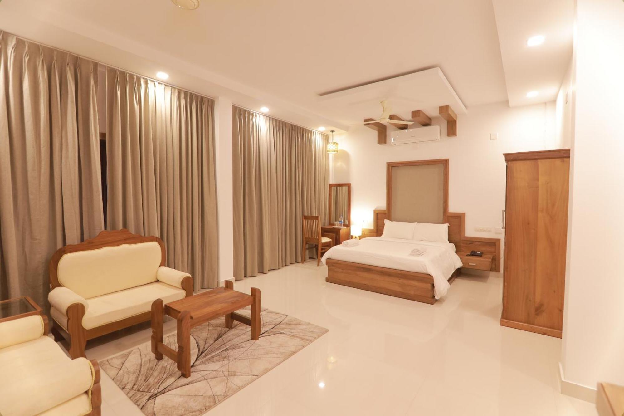 Opm Inn Payyannur ภายนอก รูปภาพ